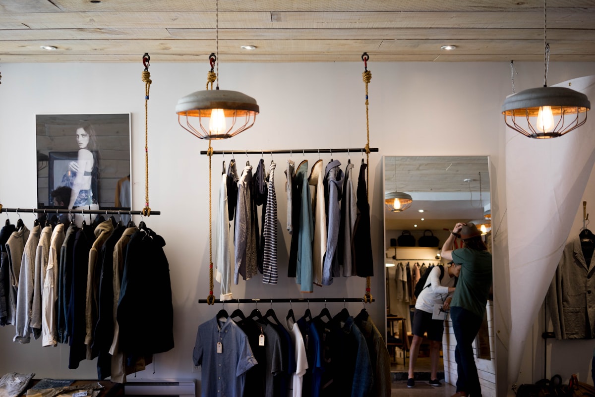 Apparel boutique with garments on racks