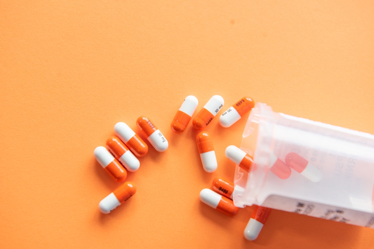 Pharmaceutical capsules and dispensing bottle