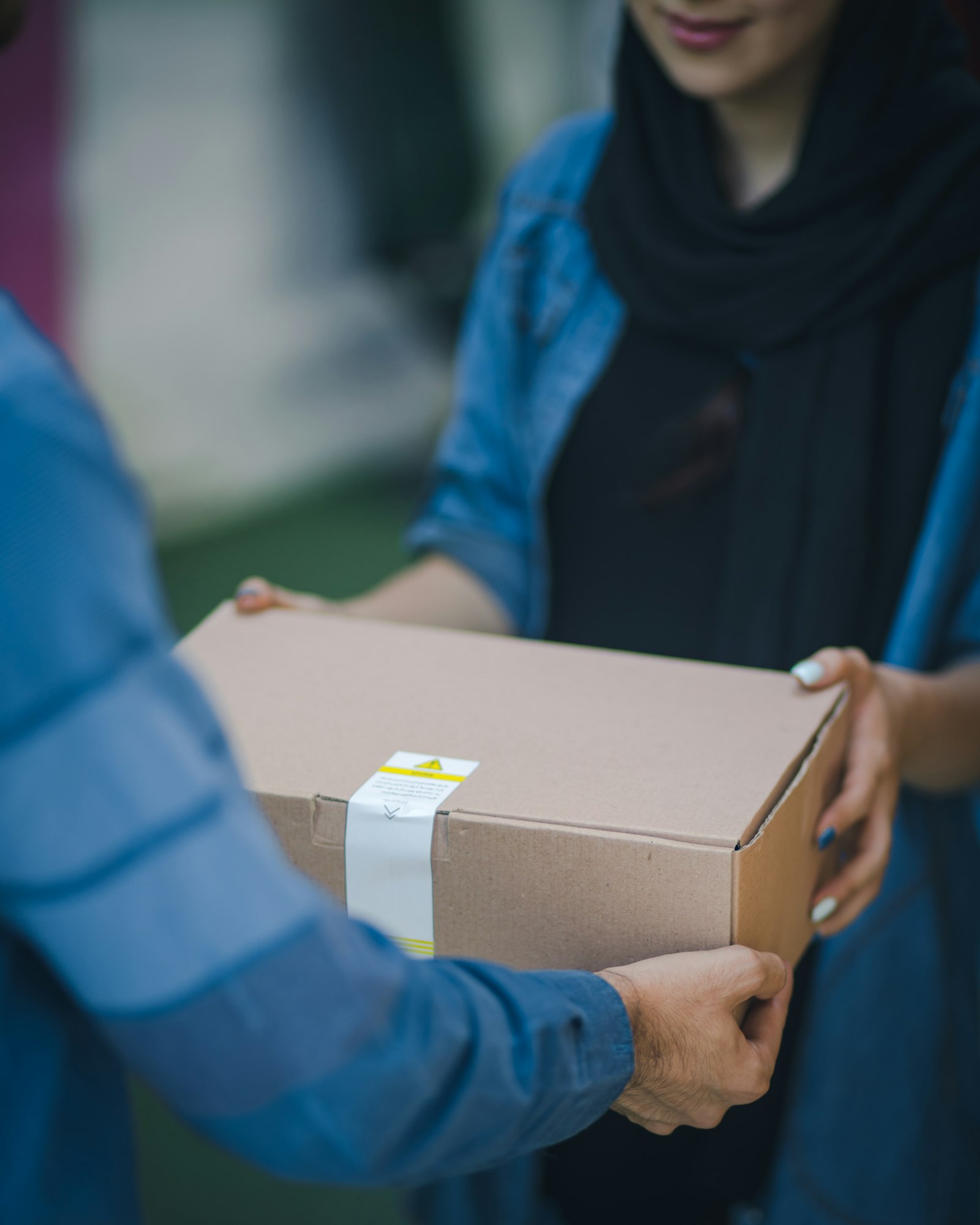 Parcel handed to a customer at the door